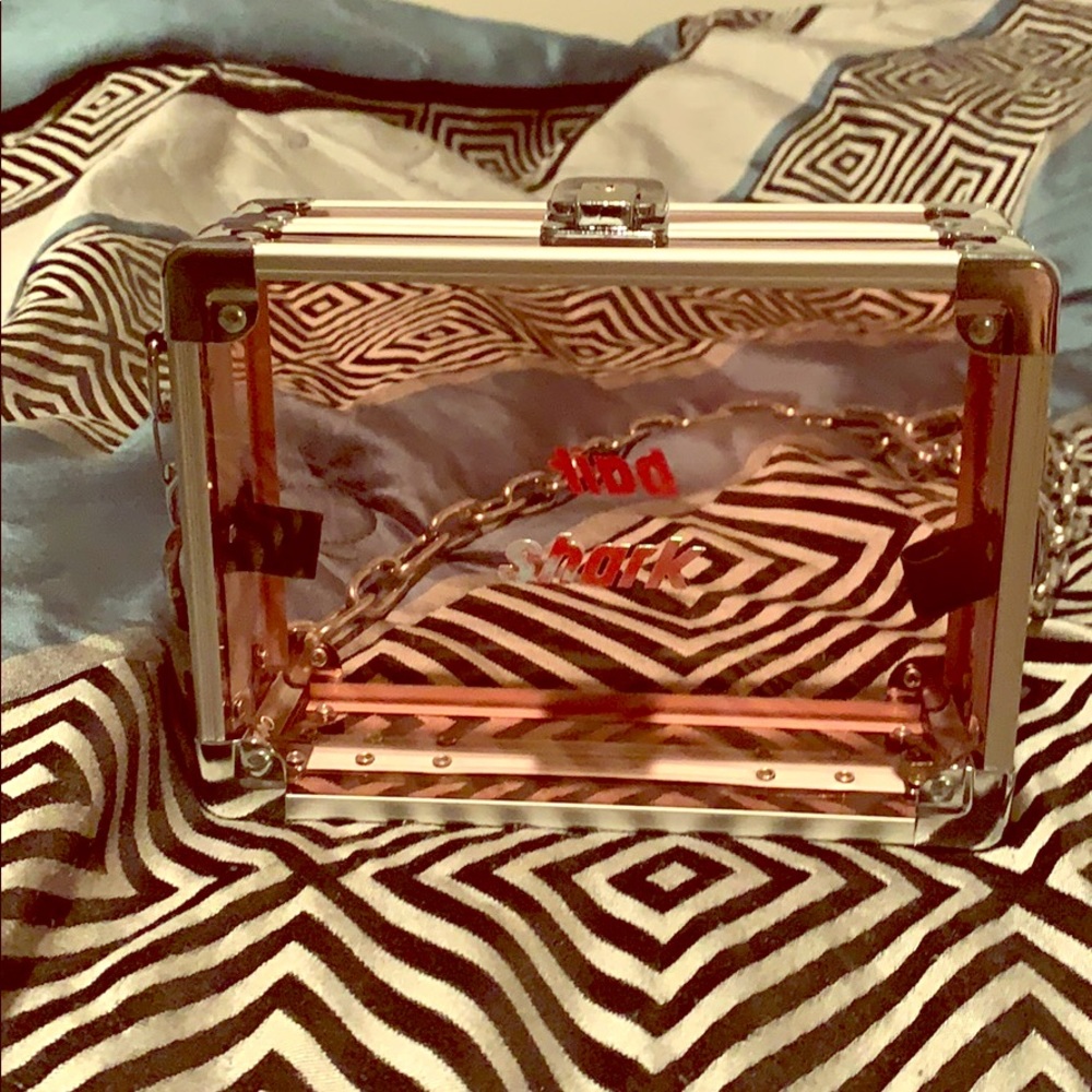 Custom Perspex purse that says shark bait